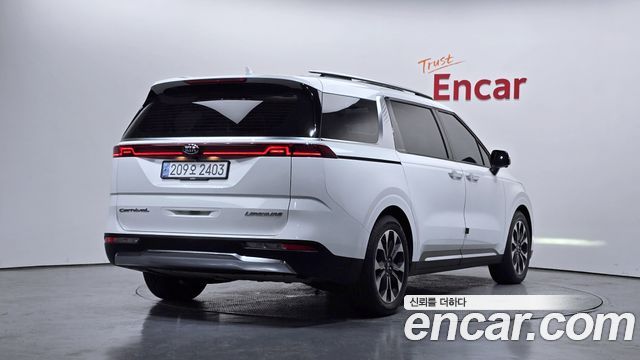 Kia Canival 2021 — photo 2