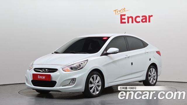 Hyundai Accent 2012 — photo 1