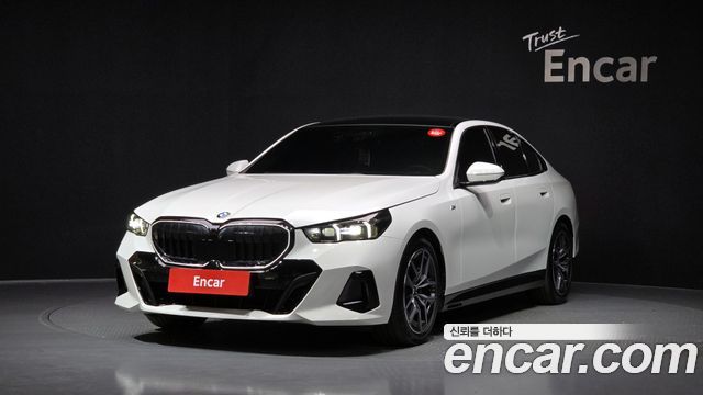 BMW 5-Series 2024 — photo 1