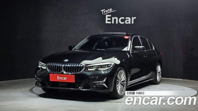 BMW 3-Series 2022 — photo 1