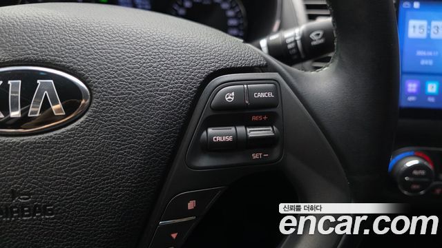 Kia K3 2015 — photo 24