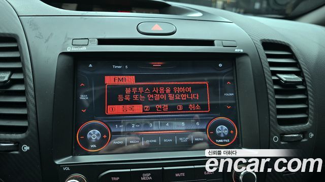 Kia K3 2015 — photo 21