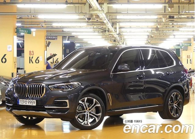 BMW X5 2022 — photo 1