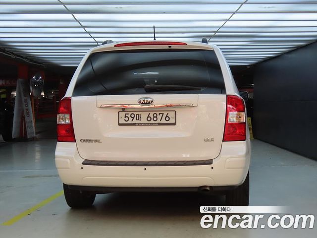 Kia Canival 2013 — photo 3