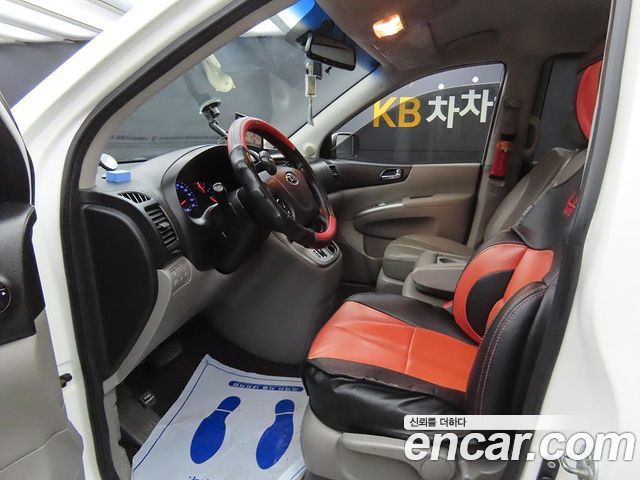 Kia Canival 2013 — photo 5