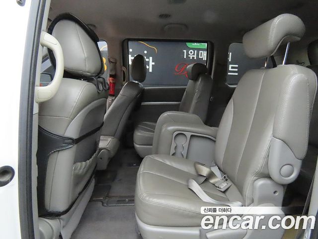 Kia Canival 2013 — photo 6