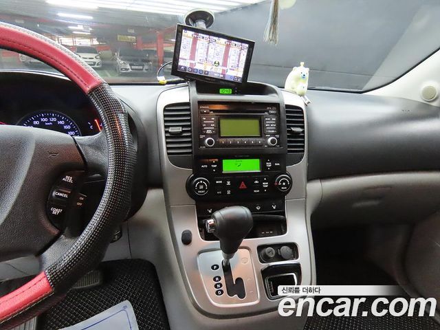 Kia Canival 2013 — photo 10