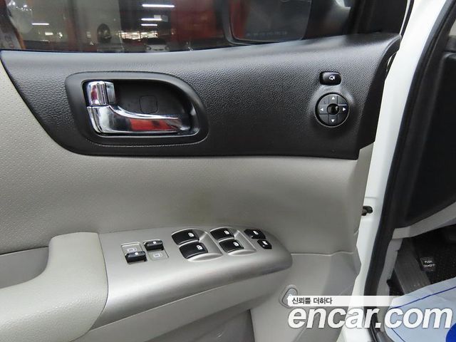 Kia Canival 2013 — photo 16