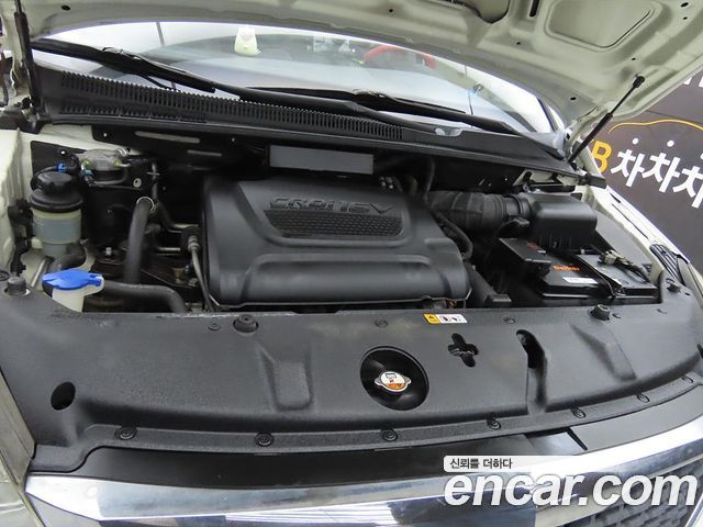 Kia Canival 2013 — photo 19