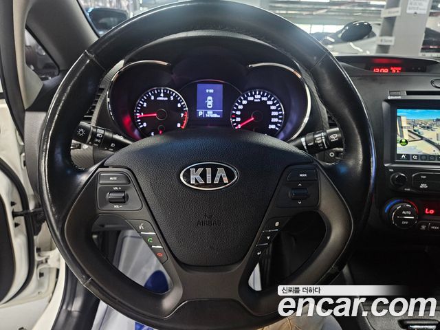 Kia K3 2013 — photo 19