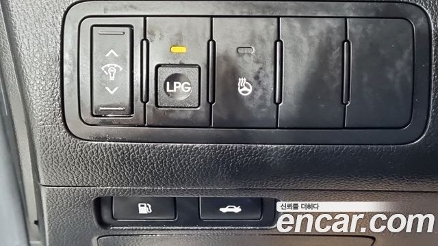 Kia K7 2011 — photo 17