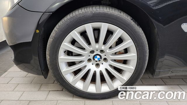 BMW 7-Series 2010 — photo 5