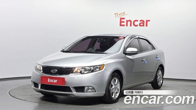 Kia Porte 2012 — photo 1