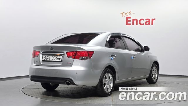 Kia Porte 2012 — photo 2