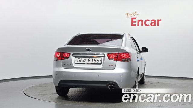 Kia Porte 2012 — photo 4