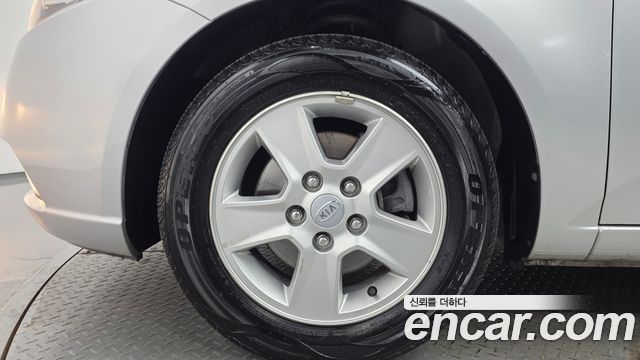 Kia Porte 2012 — photo 5