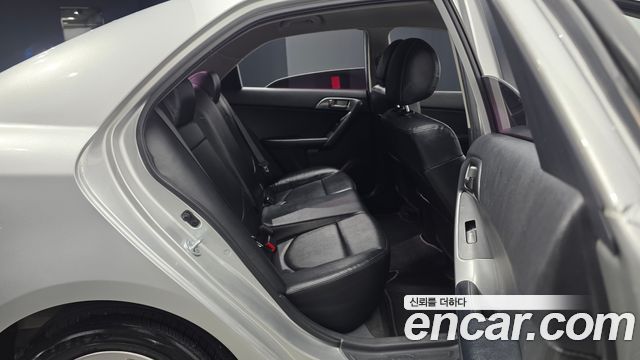 Kia Porte 2012 — photo 11