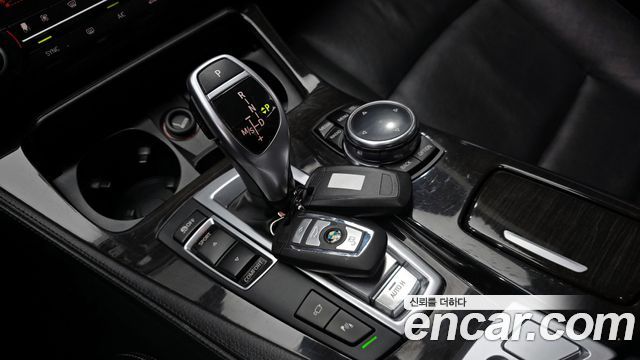 BMW 5-Series 2014 — photo 9