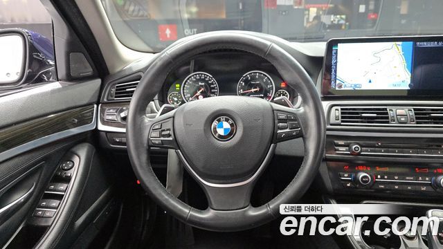 BMW 5-Series 2014 — photo 13
