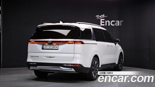Kia Canival 2021 — photo 2