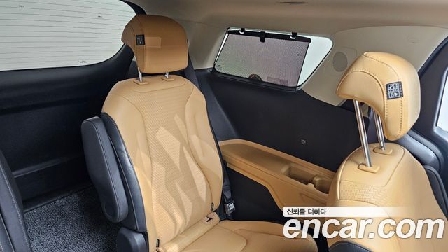 Kia Canival 2023 — photo 35