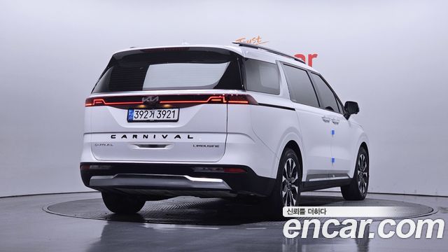 Kia Canival 2021 — photo 2