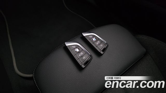 BMW 1-Series 2023 — photo 32