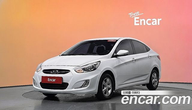Hyundai Accent 2012 — photo 1