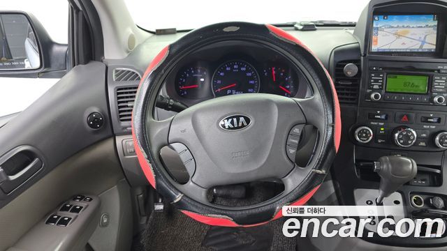 Kia Canival 2014 — photo 14