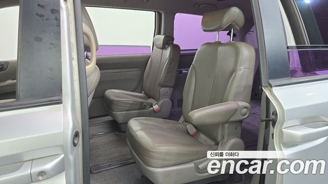 Kia Canival 2014 — photo 19