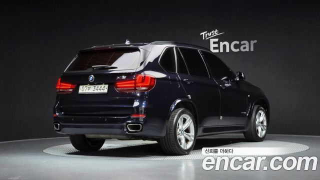 BMW X5 2018 — photo 2