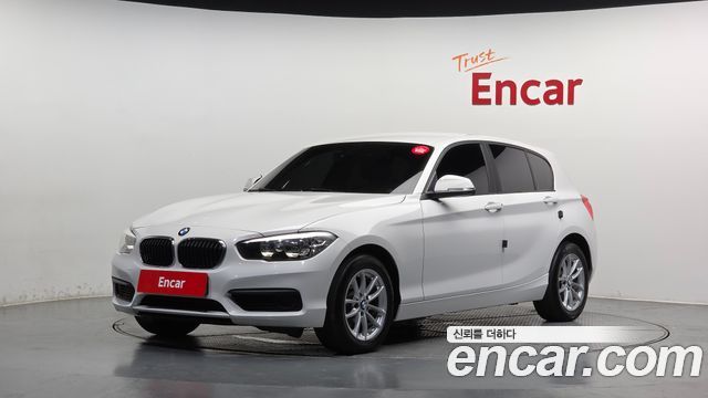 BMW 1-Series 2018 — photo 1