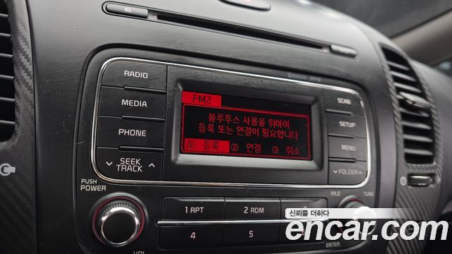 Kia K3 2015 — photo 14