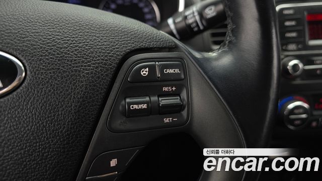 Kia K3 2015 — photo 19