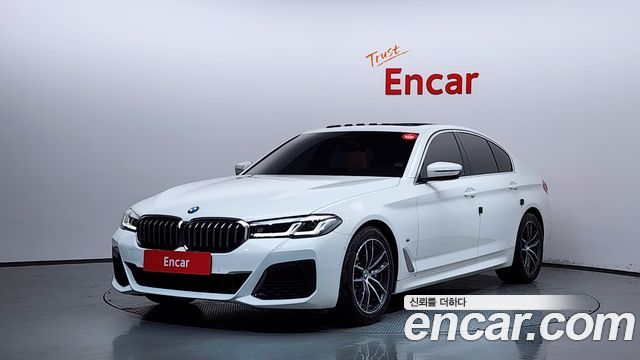 BMW 5-Series 2022 — photo 1