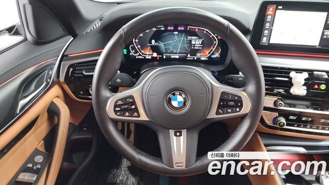 BMW 5-Series 2022 — photo 19