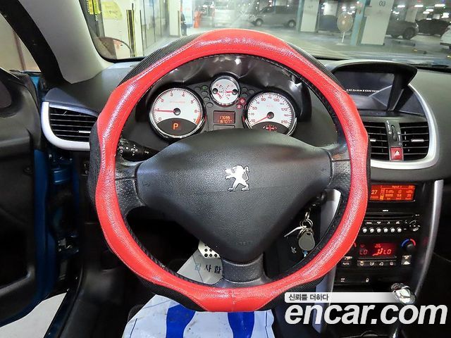 Peugeot 207 2009 — photo 18
