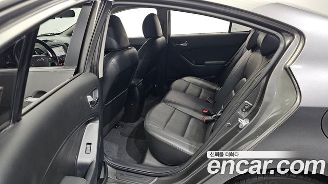 Kia K3 2013 — photo 18
