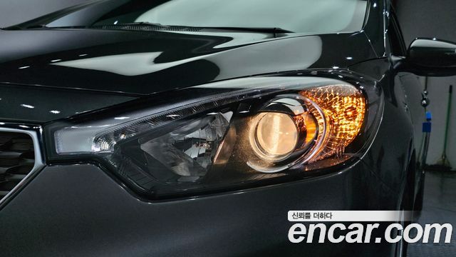 Kia K3 2013 — photo 8