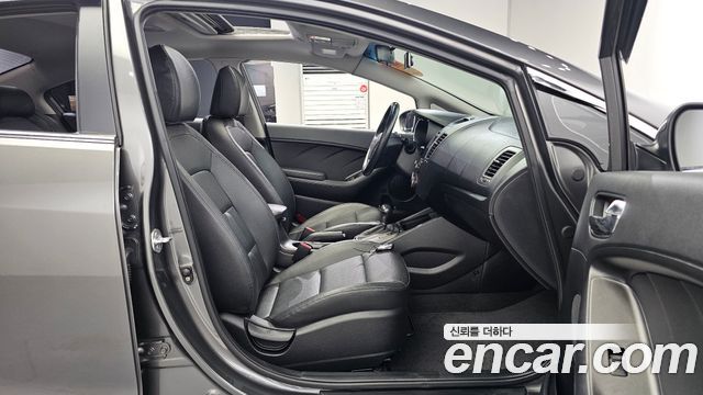 Kia K3 2013 — photo 16
