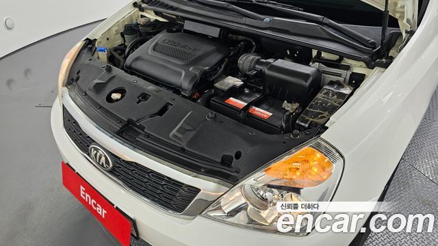 Kia Canival 2013 — photo 6