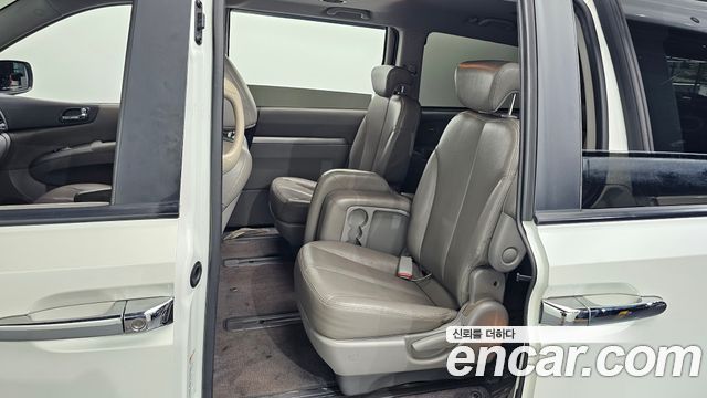 Kia Canival 2013 — photo 17