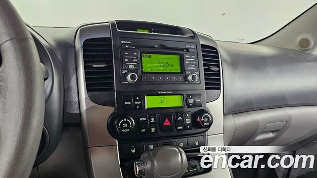 Kia Canival 2013 — photo 18