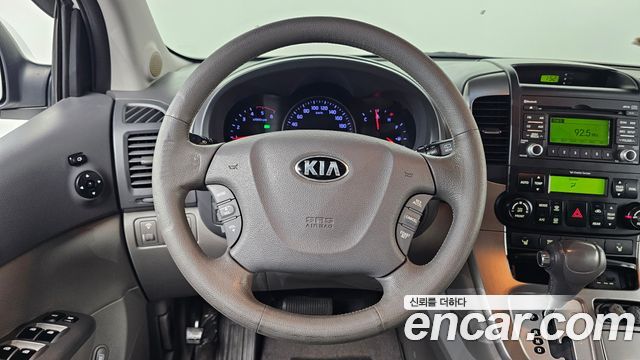 Kia Canival 2013 — photo 20