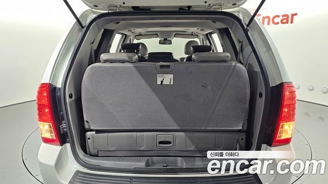 Kia Canival 2013 — photo 23