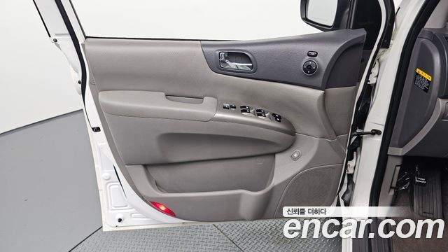 Kia Canival 2013 — photo 14
