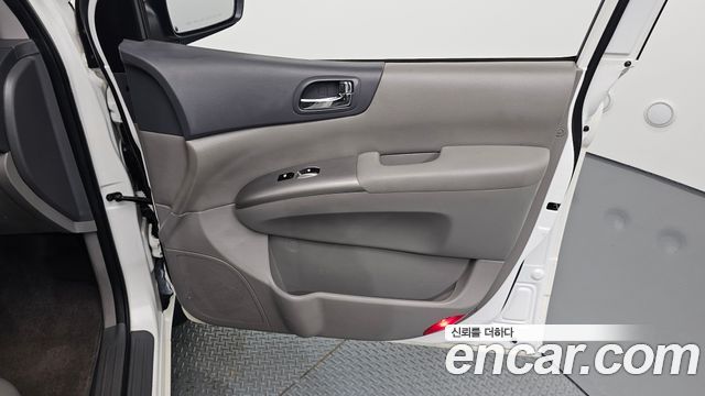 Kia Canival 2013 — photo 15