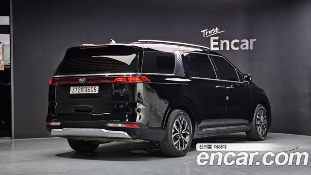 Kia Canival 2021 — photo 2