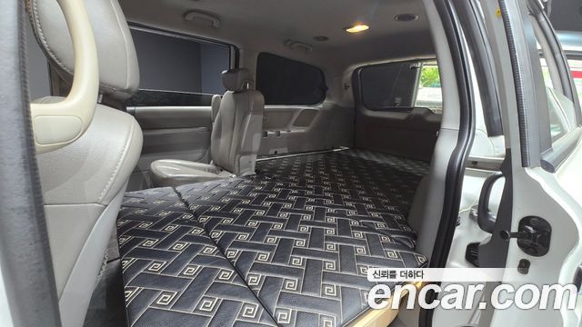 Kia Canival 2014 — photo 11