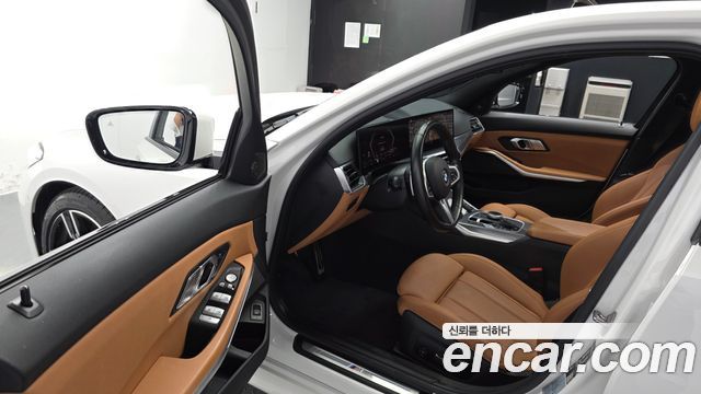 BMW 3-Series 2024 — photo 13